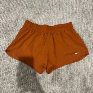 Nike Women's Athletic Shorts in Rust